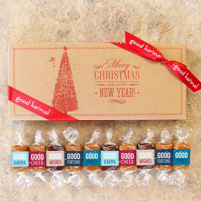 Vintage Christmas Caramel Gift Box comes tied with a red satin bow and printed with a vintage Christmas tree and the message, "Merry Christmas and Happy New Year!"