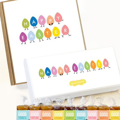 Good Karmal caramel gift boxes with colorful eggs with legs spelling out Happy Easter. Caramels shown are wrapped in a pastel palette and the positive words, Good Times; Good Fortune; Good Quotes; Good Karma; and Good Vibes. Sea salt, Chocolate Sea Salt and Vanilla caramels.