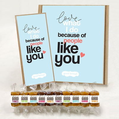 All-natural, gluten-free caramels shown with blue gift boxes for business gifting that say "love what I do because of people like you." Each caramel is wrapped in positive quotes and Good Times; Good Quotes; Good Fortune; Good Karma; and Good Vibes.