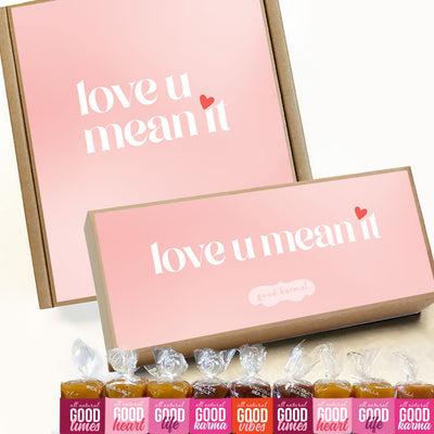 All-natural, gluten-free caramels shown with soft pink gift boxes that say "love u mean it" Each caramel is wrapped in positive quotes and Good Times; Good Heart; Good Life; Good Karma; and Good Vibes.