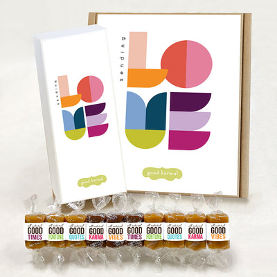 All-natural, gluten-free caramel gift boxes that say "Sending Love". Each caramel is wrapped in positive quotes and Good Times, Good Fortune, Good Quotes, Good Karma and Good Vibes.