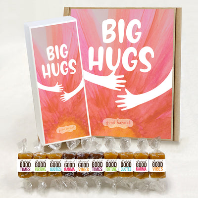 Good Karmal caramel candy wrapped in positive and uplifting quotes in a gift box that says Big Hugs