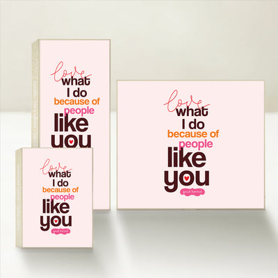 Three Good Karmal caramel gift boxes that say "love what I do because of people like you" on a light pink background. 