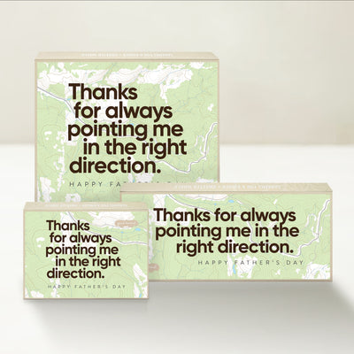 Three Good Karmal caramel gift boxes that say "Thanks for always pointing me in the right direction" and "Happy Father's Day." 