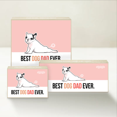 Three Good Karmal caramel gift boxes that say "Best Dog Dad Ever" with a whimsical illustration of a dog.